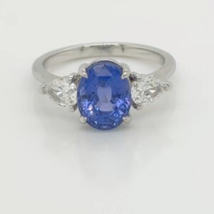 Platinum Unheated Oval Sapphire & Diamond Three Stone Ring